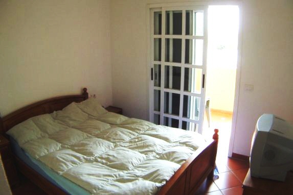 Bedroom with access to the terrace