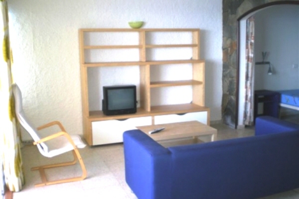 Living room with opening to the bedroom