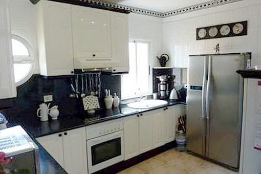 Modern kitchen with branded appliances