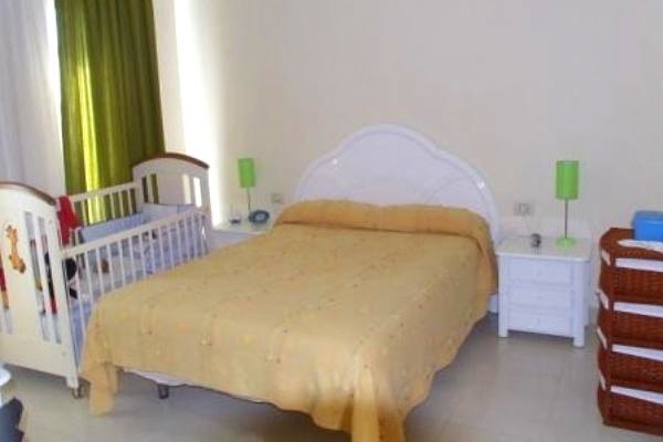 One of the 4 bedrooms