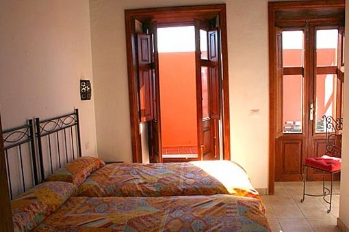 Cosy bedroom with exit to the terrace