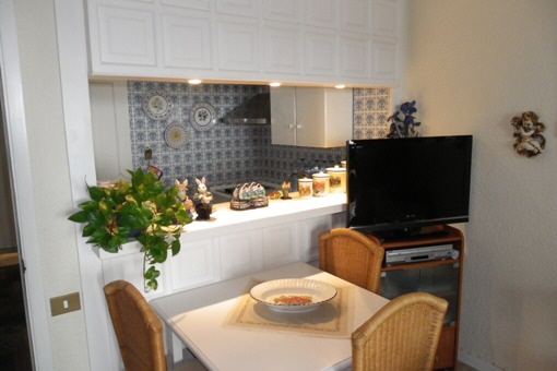 Bright modern kitchen with dining area