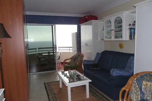 Living room with panoramic views and folding beds