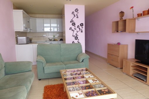 Living room with open kitchen