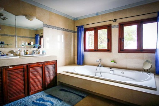 Bathroom with bath tub and shower