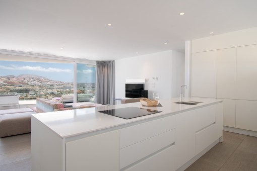 Fully equipped modern kitchen in white
