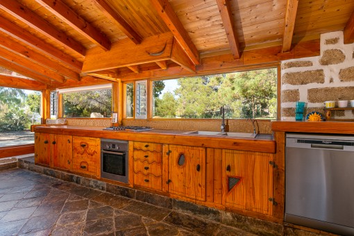 Wooden kitchen with garden viewl