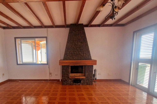 Spacious living room with a fireplace