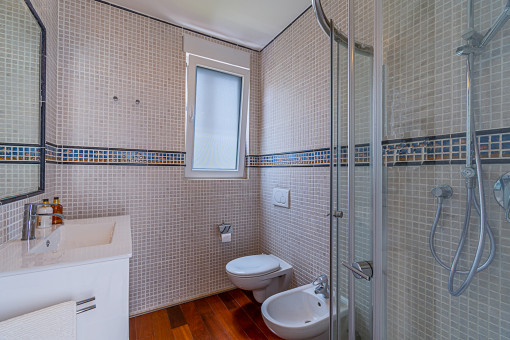 One of 3 bathrooms