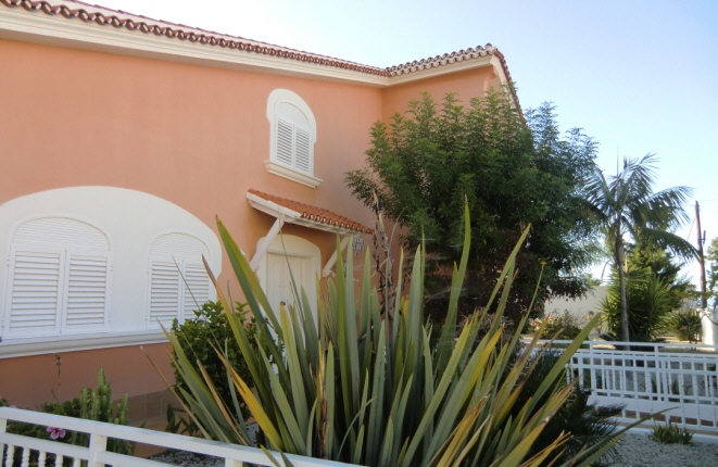 Access to the main entrance and planted front garden