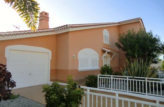View of the front garden and the garage