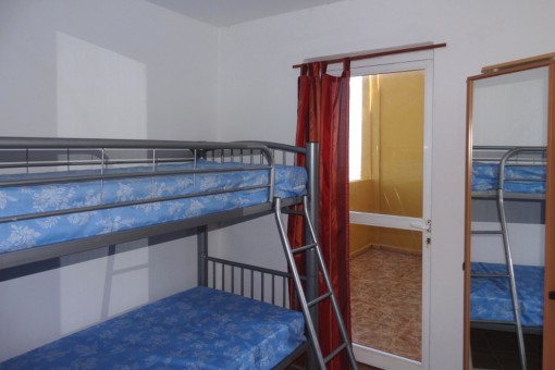 Another bedroom with a bunk bed
