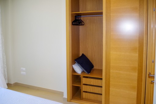 Bedroom with built-in wardrobe