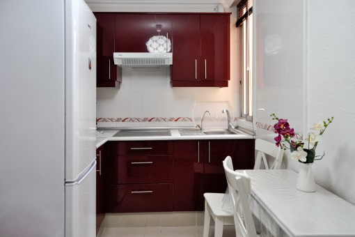 Fully equipped kitchen in red